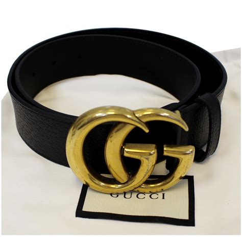 black gucci belt with buckle.